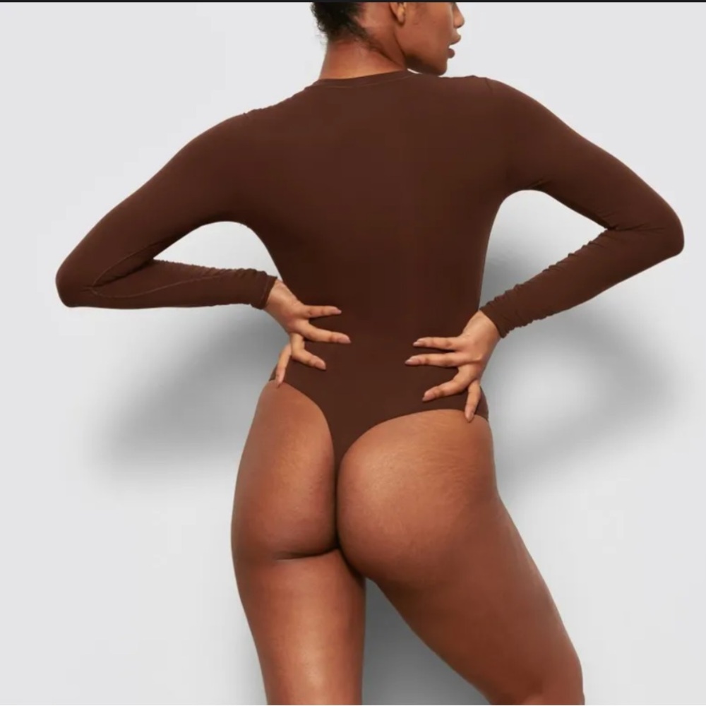 SKIMS bodysuit thing in color Jasper